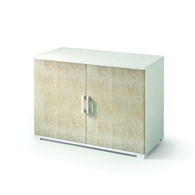 Meuble de rangement blanc et chêne avec double porte et une étagère