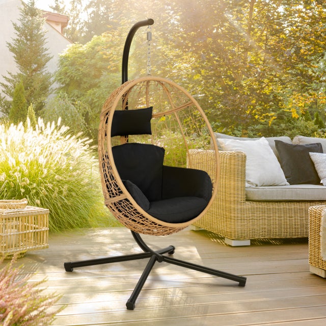 Fauteuil oeuf suspendu ajouré effet rotin avec coussin noir