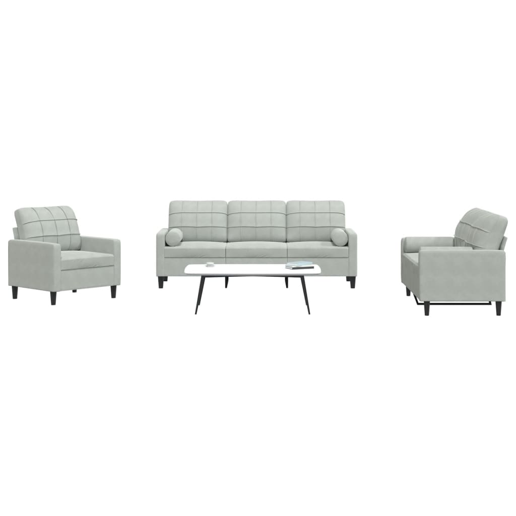 Conjunto de sofás de 3 piezas y cojines y bolsters de terciopelo.