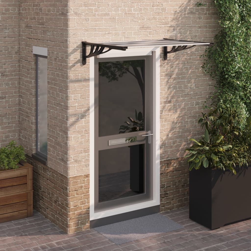 Maison exclusive - marquesina puerta policarbonato negro y transparente 122x90 cm