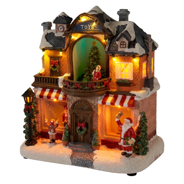 Casetta natalizia decorativa Well Home con Babbo Natale, albero di Natale con luci LED, movimento e musica, 23,5x14,5x23,5 cm