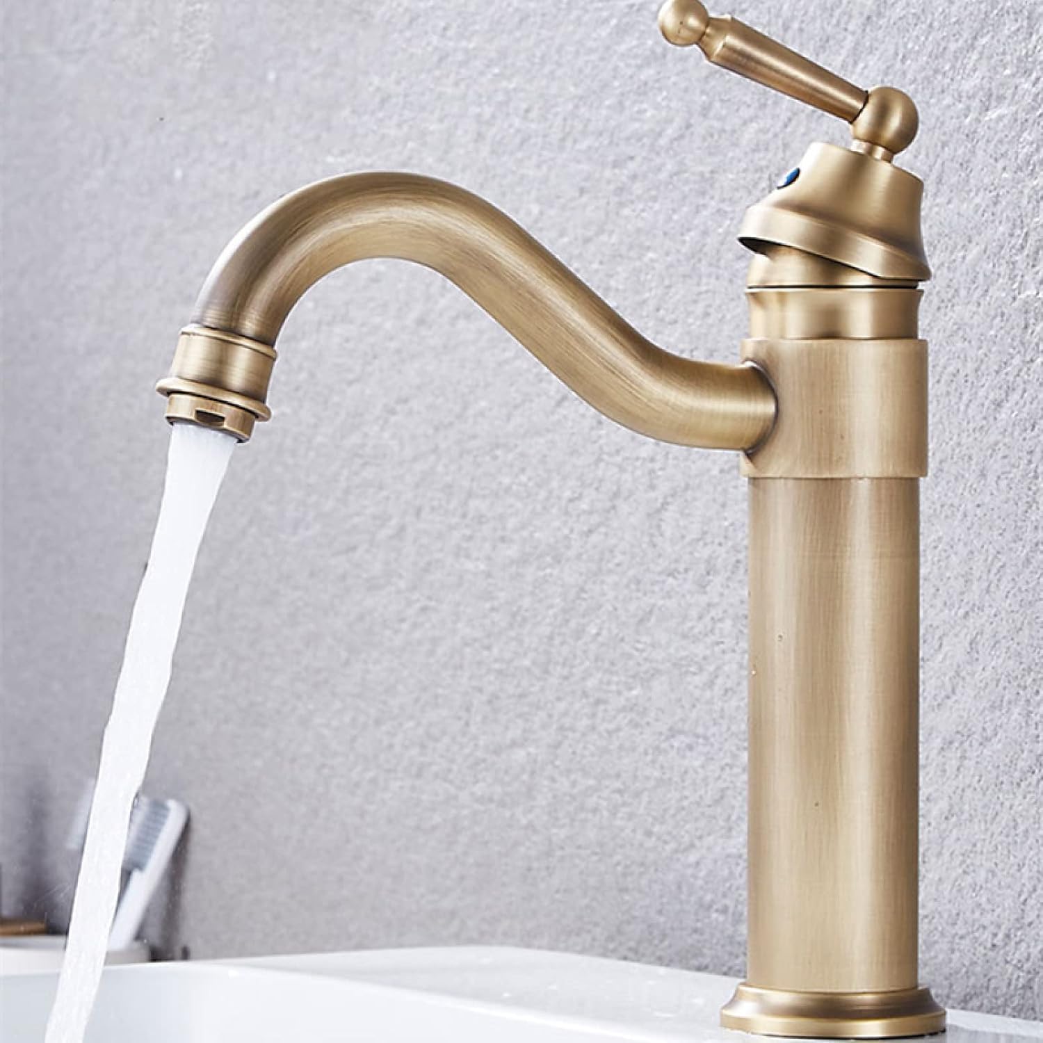 Antyczny kran do łazienki z mosiądzu, obrotowy o 360° kran do umywalki łazienkowej, bateria mieszająca ciepłą i zimną wodę w stylu vintage