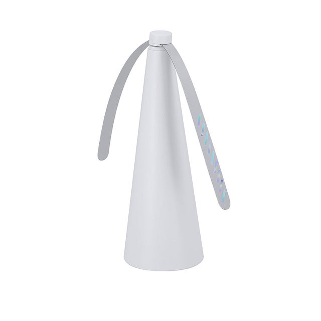 Ventilador de mesa anti-moscas com 2 lâminas de efeito UV, projetado para repelir insetos de forma silenciosa e sem produtos químicos.