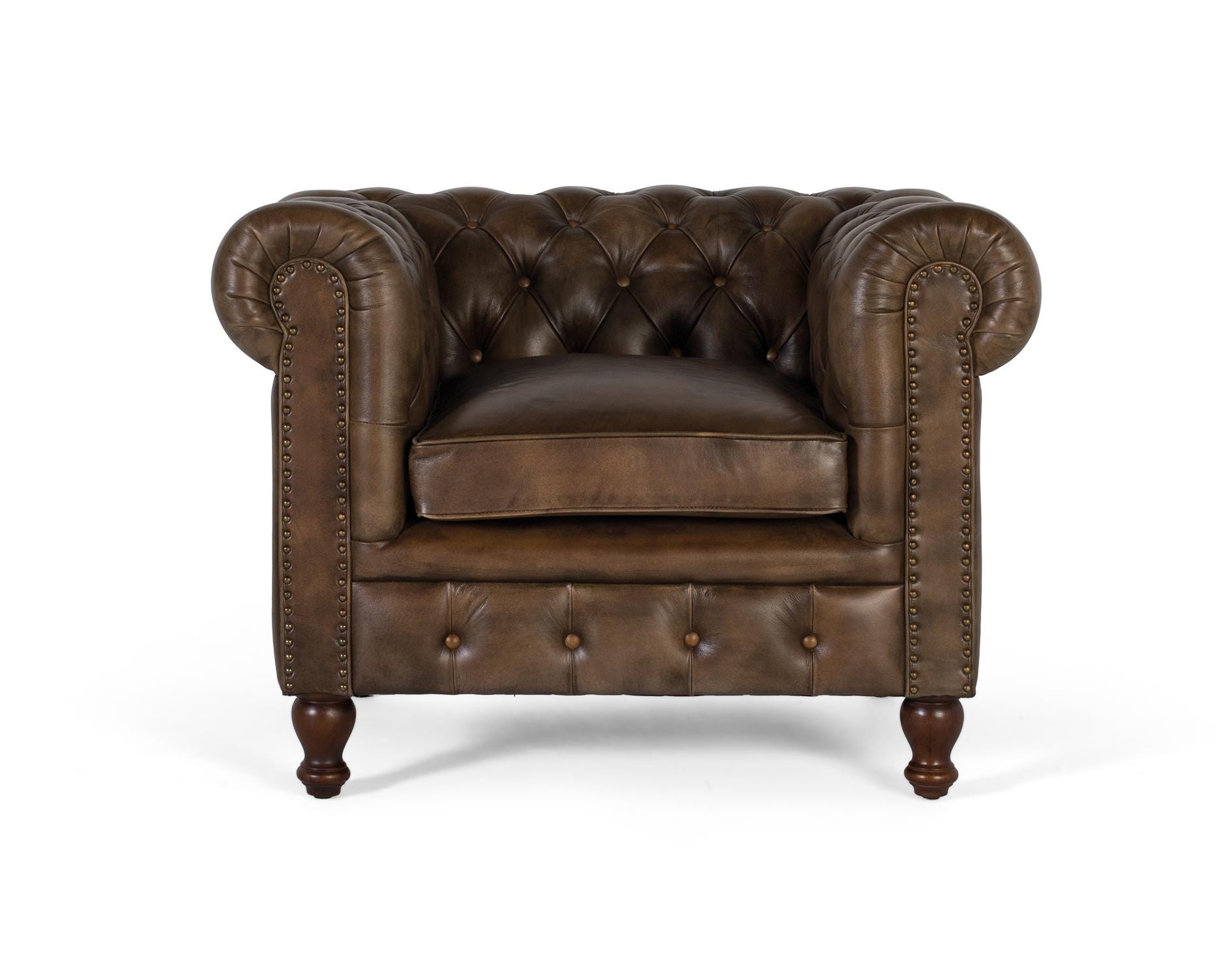 Poltrona Chester realizzata in pelle con finitura capitonné