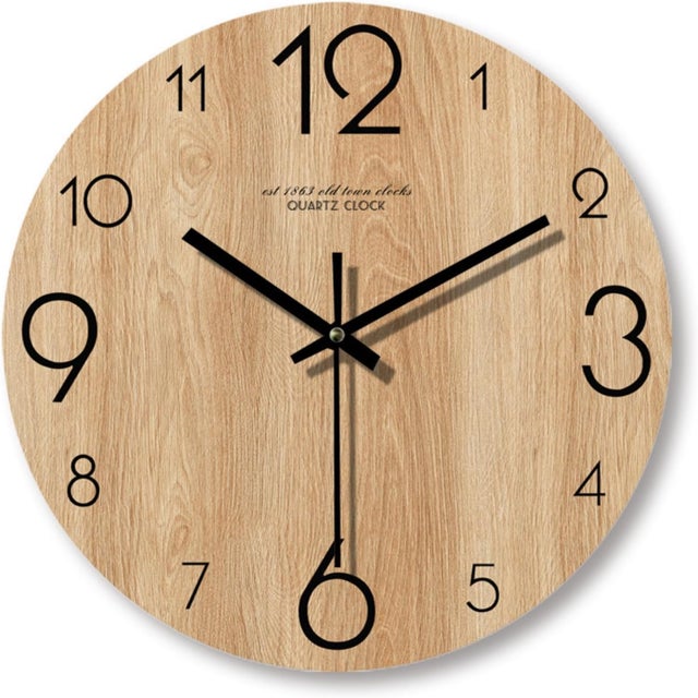 Horloge murale minimaliste rétro imitation bois 35 cm, silencieuse, moderne et créative. Idéale pour salon et cuisine.