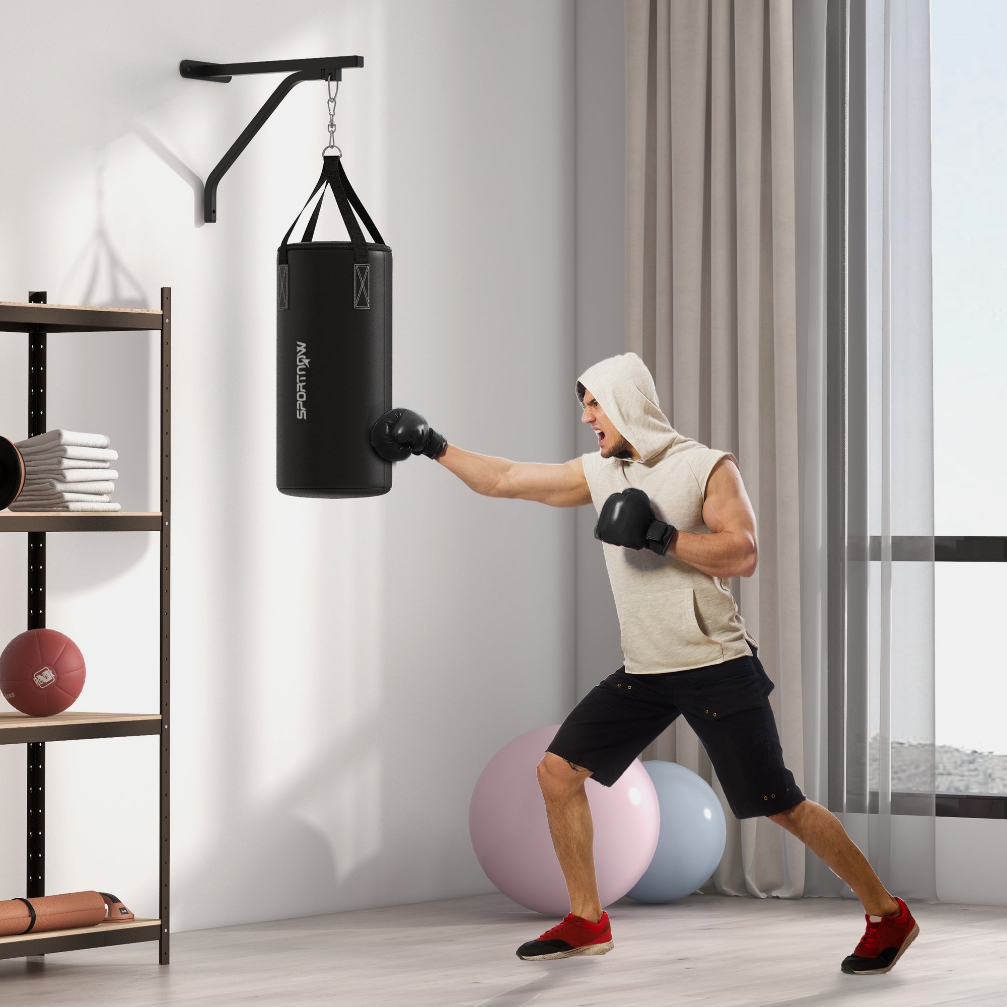 Supporto a muro per sacca da boxe in acciaio nero con guanti e