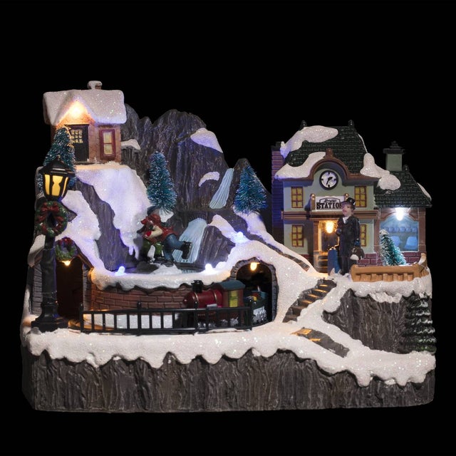 Village lumineux gare et patineurs 9 LED l.23cm musical - Feeric lights & christmas