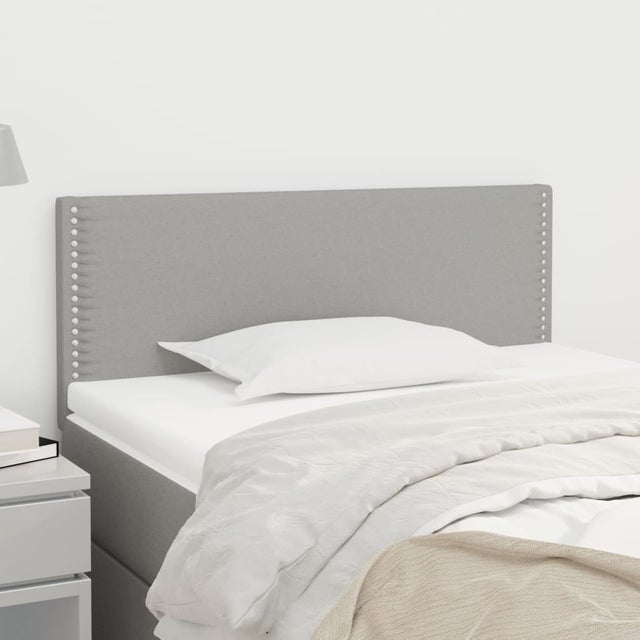Cabeceira de cama tecido 100x5x78/88 cm cinzento-claro vidaXL