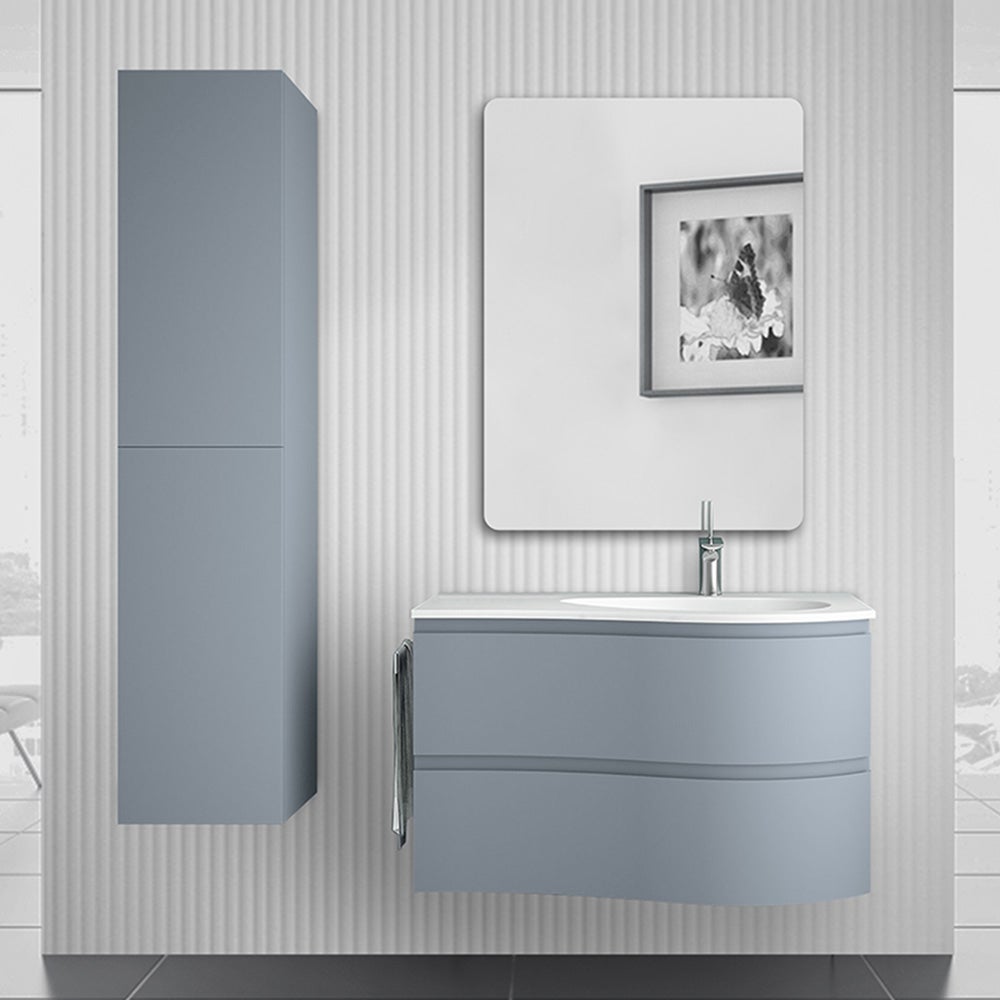 Mueble de baño suspendido melody de 90 cm en color azul claro con bañera a la derecha.
