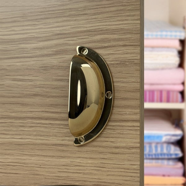 Poignée de meuble COQUILLE, laiton poli entraxe 64 mm