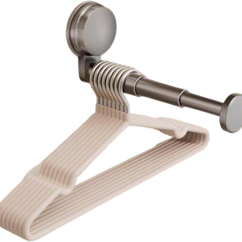 Wysuwana, oszczędzająca miejsce, montowana na ścianie suszarka na ubrania, odpowiednia do łazienek, balkonów i pralni, w kolorze szarym.