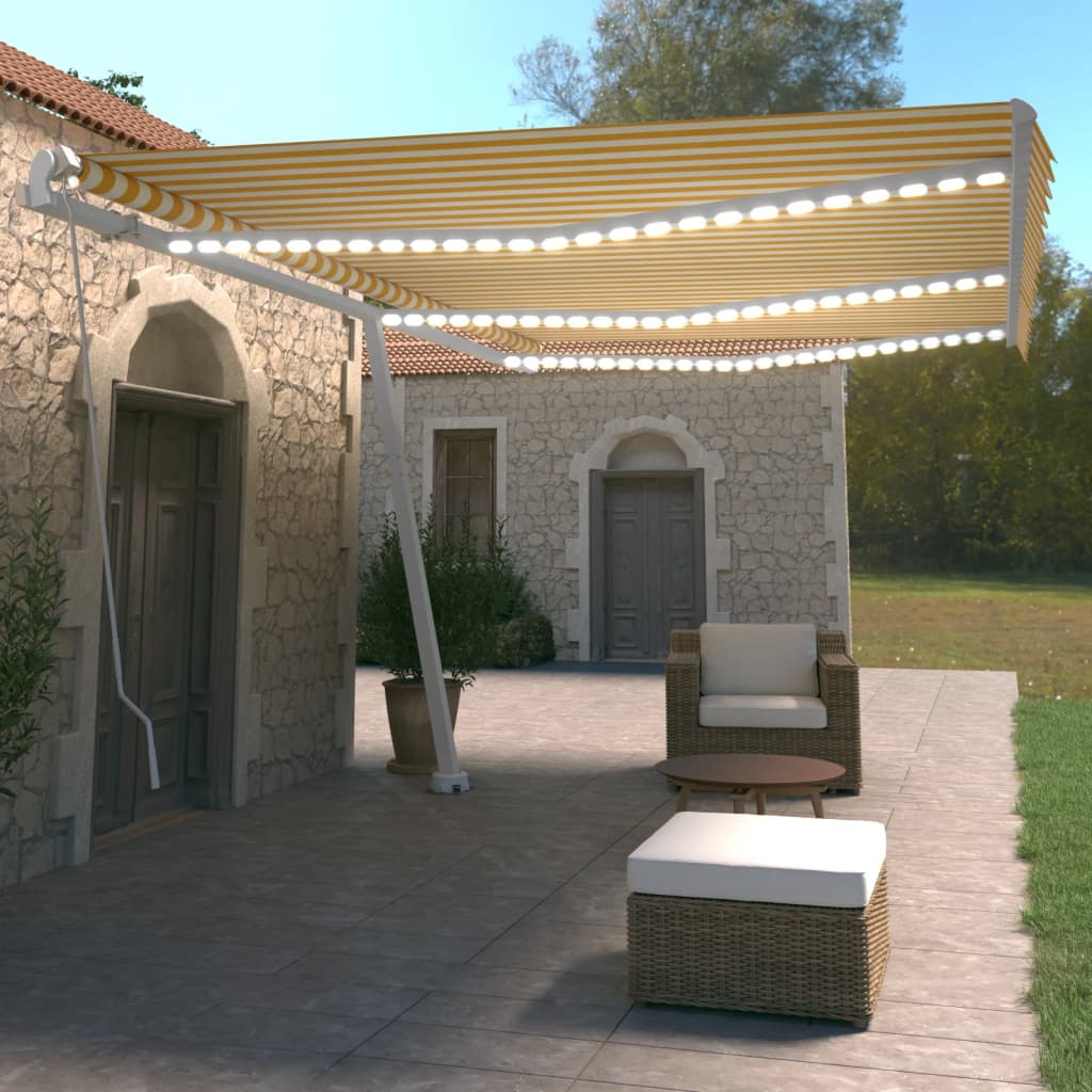 Ręcznie zwijana markiza z LED, 600x350 cm, żółto-biała