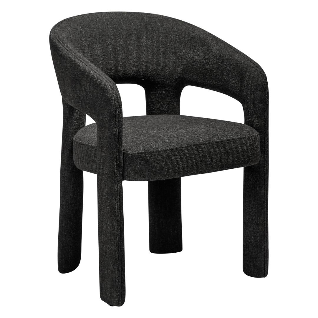 Splendor Dan-Form krzesło stołowe z podłokietnikami bouclé czarny.