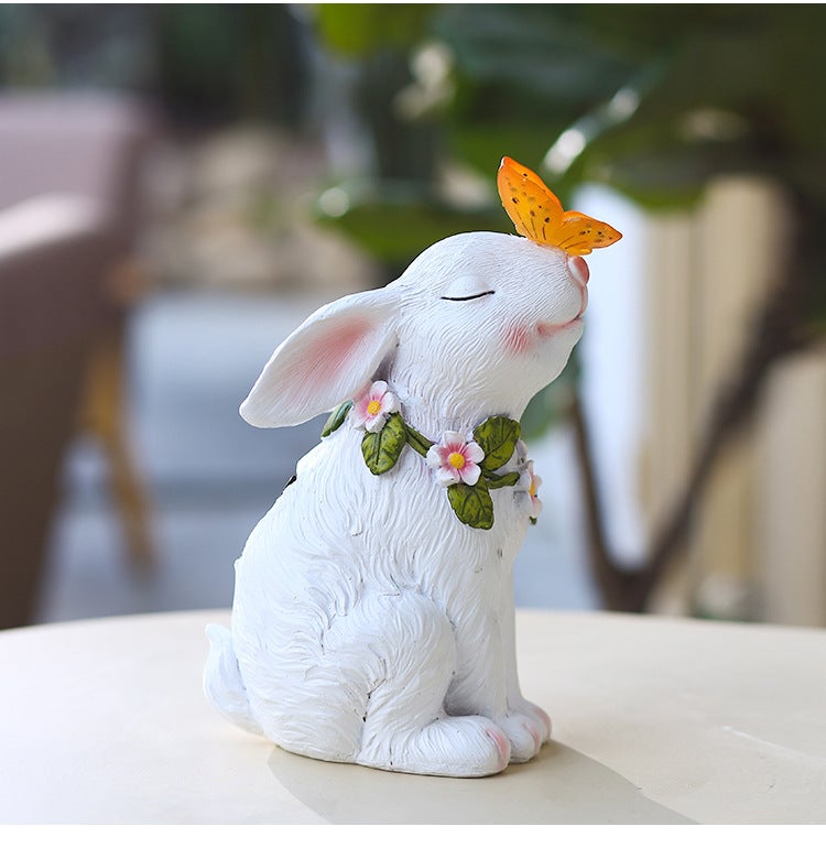 Solarna statua ogrodowa dekoracyjna lampka w kształcie królika z motylem solarna dekoracyjna figurka królika zewnątrz dekoracyjna lampa żywicy biała