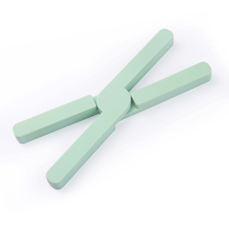 Suport pliabil din silicon pentru vase fierbinti Flippy, verde, 14.5 x 7.5 cm