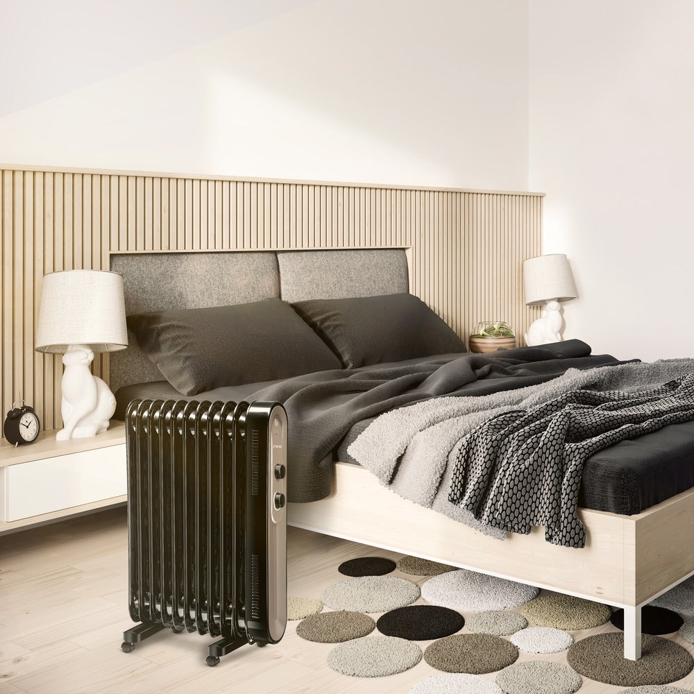 TROTEC Radiateur bain d'huile TRH 24 E Radiateur efficace à 11 éléments 2.200 W Chauffage d'appoint mobile Fonction antigel Régulation par thermostat - 5