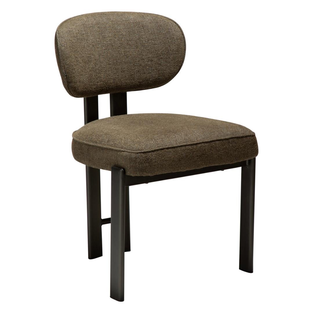 Duct Dan-Form krzesło stołowe bouclé ciemnozielony.