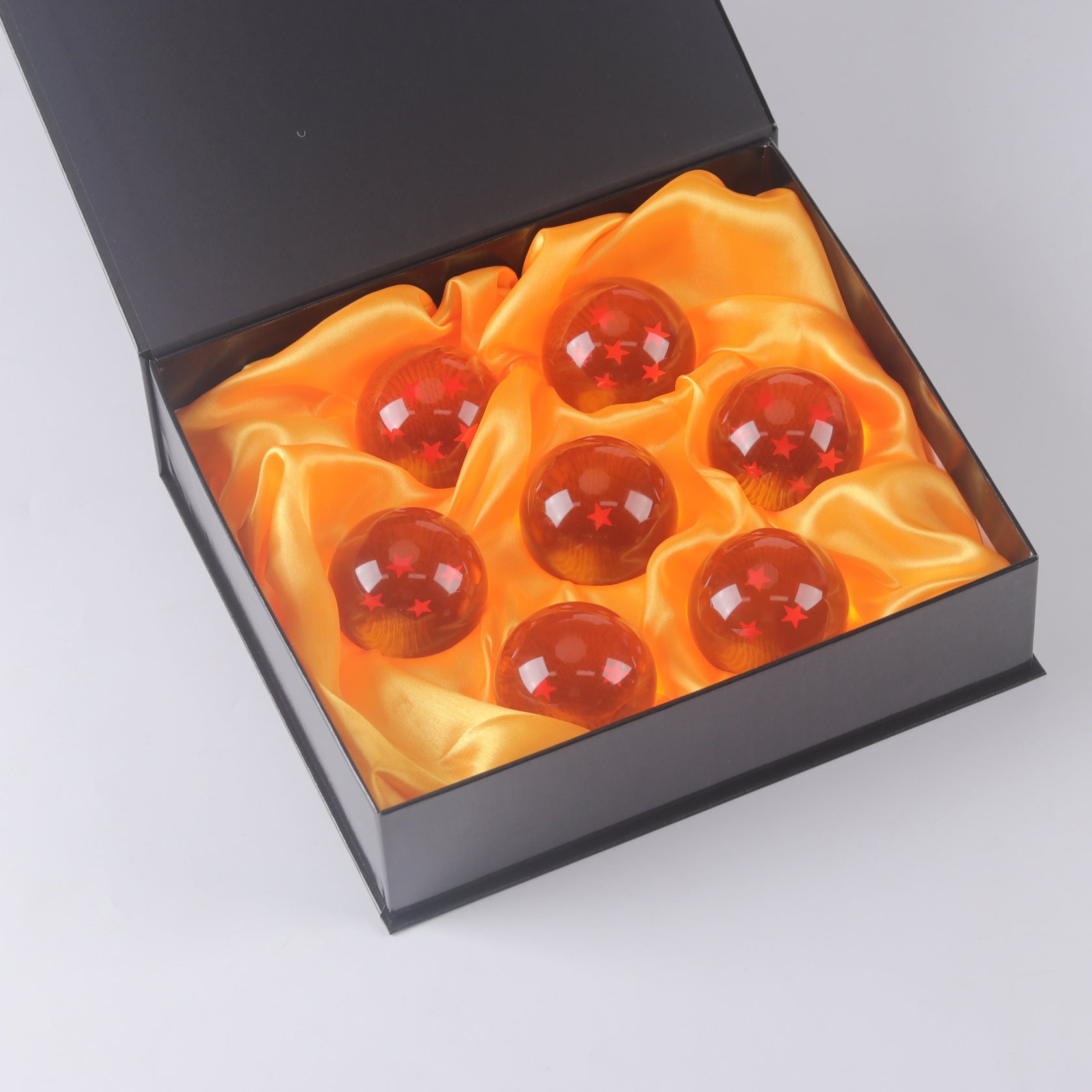 STUDIOJRH Set of 7 Dragon Balls (1 to 7 Stars) Key Chain, Sticker and Shenlong Summon Card. Ideal for collectors or as a gift for children. Dragon Ball set designed in Spain