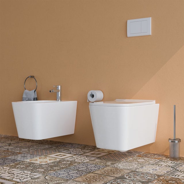 Sanitari bagno Bidet e Vaso WC SOSPESI filomuro RIMLESS in ceramica con sedile coprivaso softclose CUBE