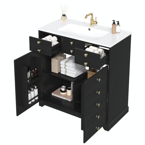 Mueble de baño negro con detalles dorados, lavabo de cerámica, con cajones y armario, estilo moderno.