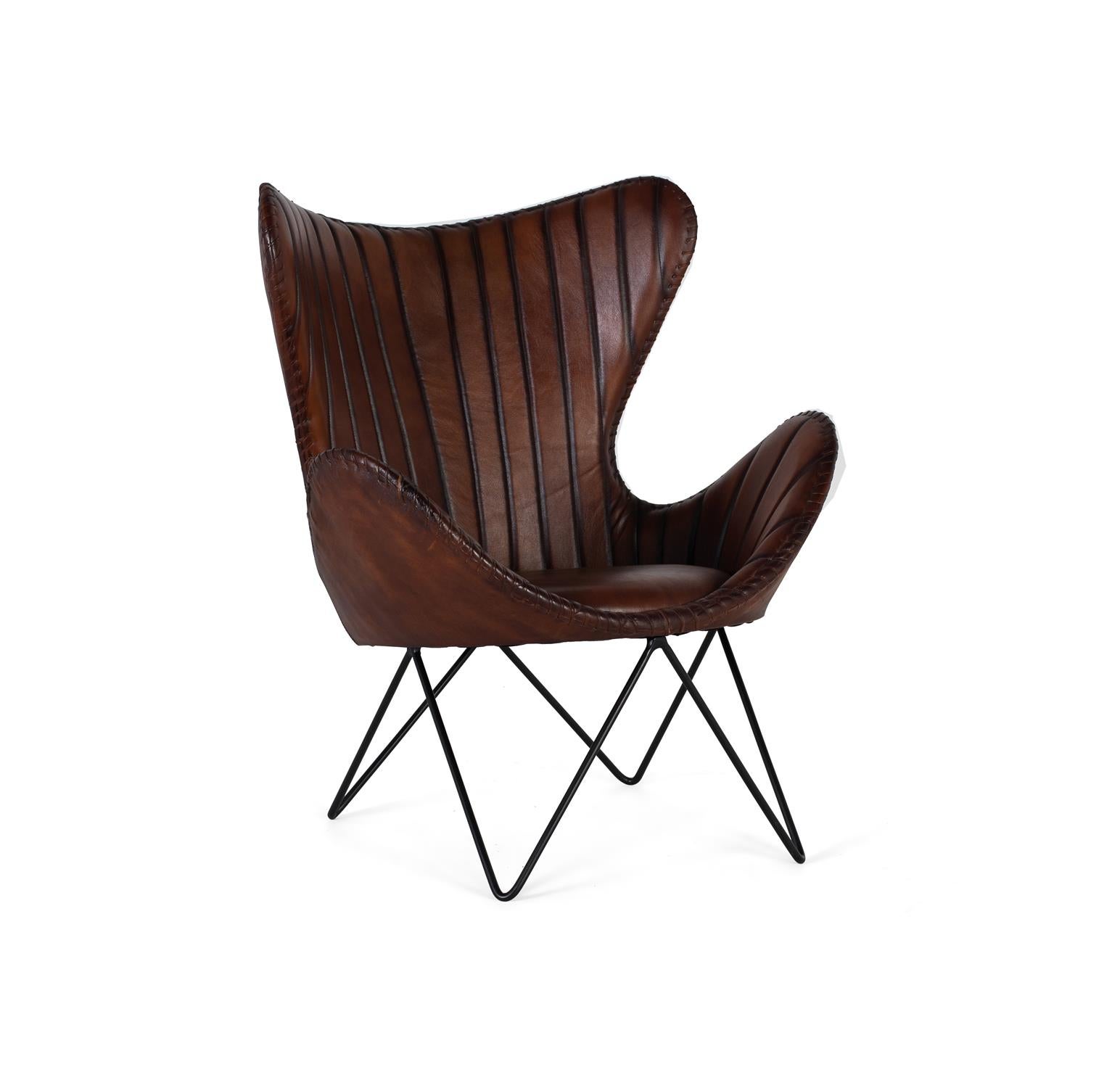 Fauteuil z brązowej naturalnej skóry z metalowymi kamieniami
