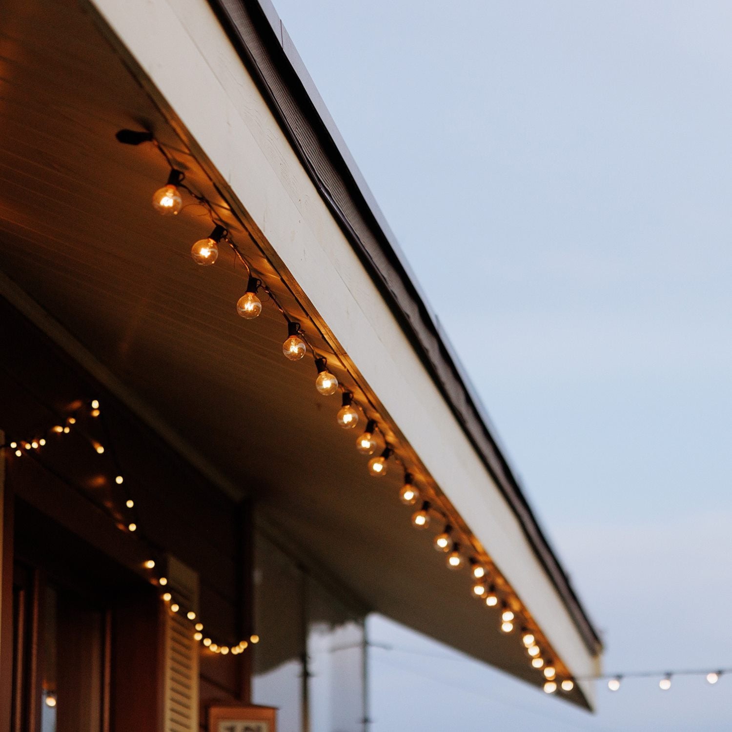 Ghirlanda luminosa per esterni 15 + 2 metri - 30 lampadine a filamento LED E12 G40 1W - IP44 - Bianco caldo - 2