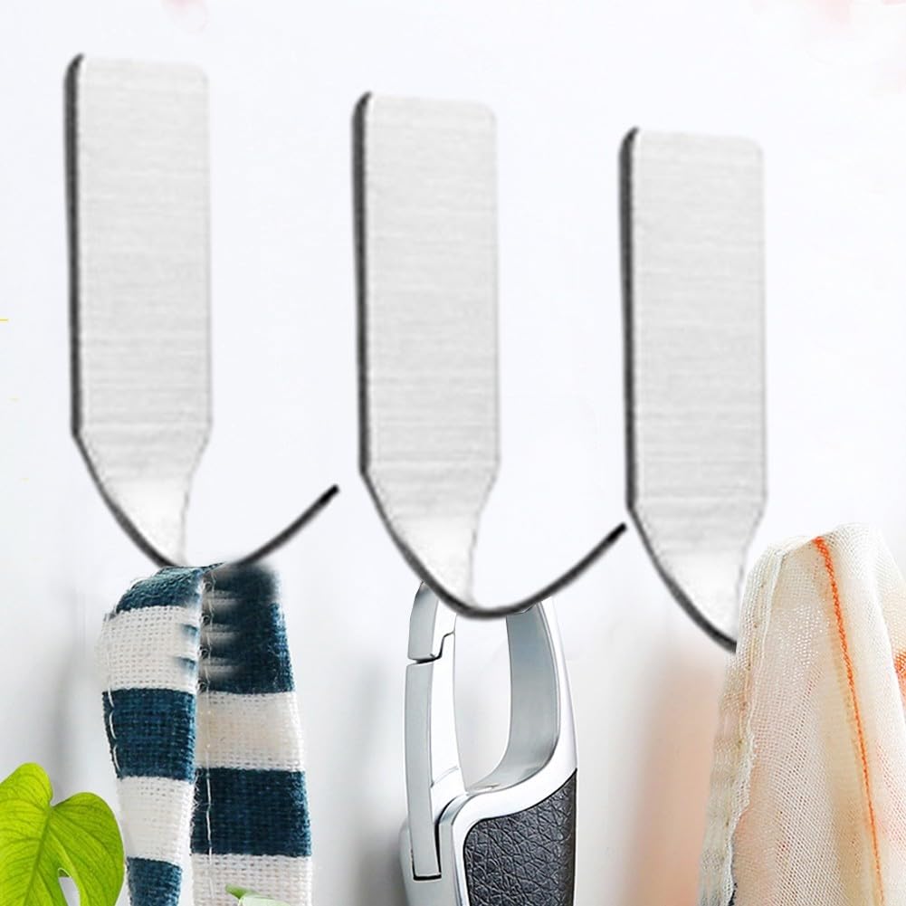 Confezione da 4 ganci adesivi antiscivolo resistenti per asciugamani da cucina e da bagno, in acciaio inossidabile, impermeabili, senza foratura | Leroy Merlin