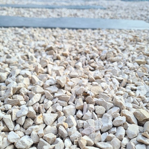 Sac +/- 20 kg = 0,4M²Gravillons blanc calcaire 6/16 - 2