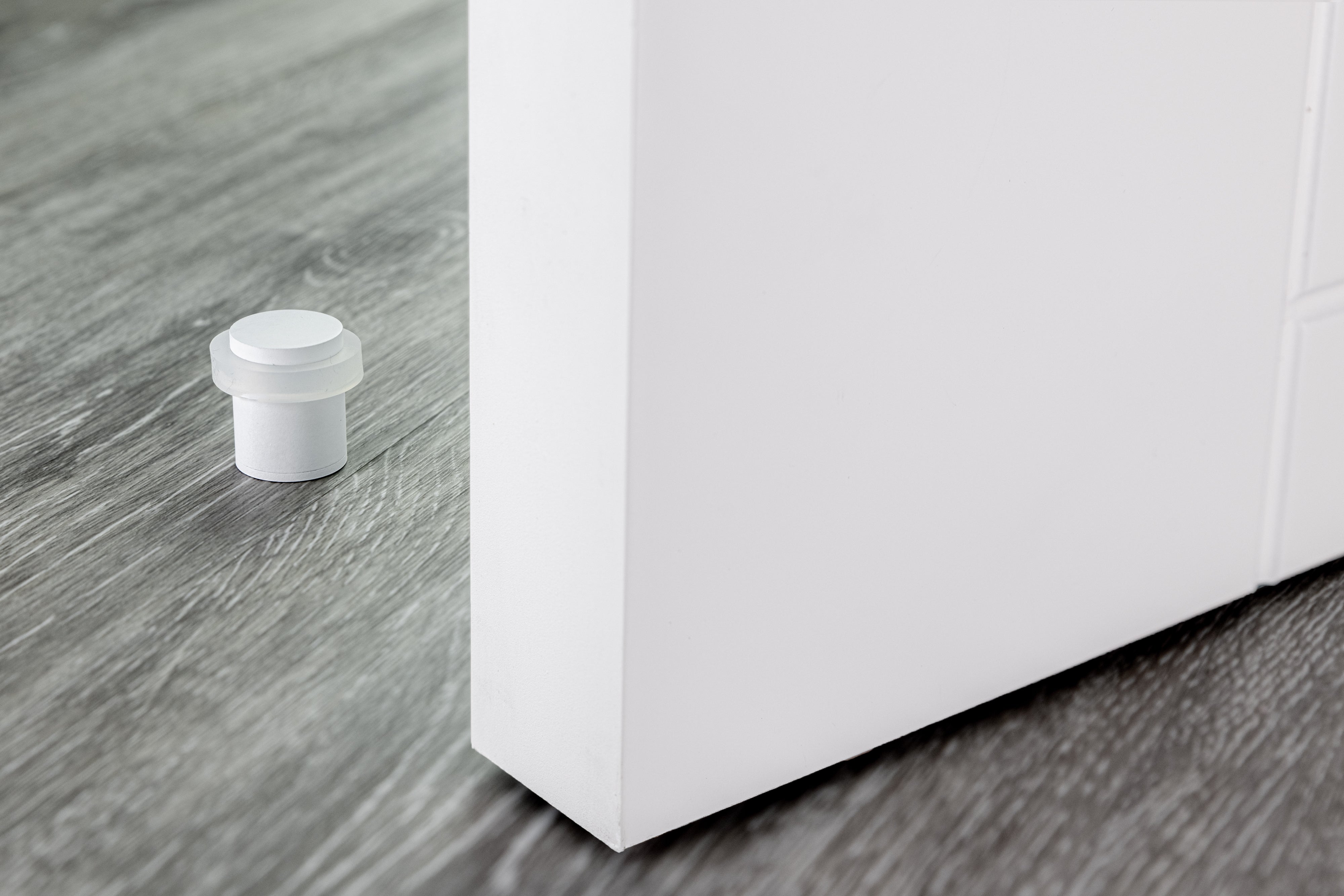 Lot de 4 butée de porte 20 x 25 mm pour sol, acier laqué blanc avec caoutchouc de protection, montage à vis, Herrajes EVI - 4