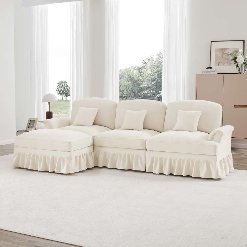 Divano modulare 3 posti a forma di L in chenille con braccioli a tromba, gonna arricciata removibile, gambe sottili e pouf mobile - 2