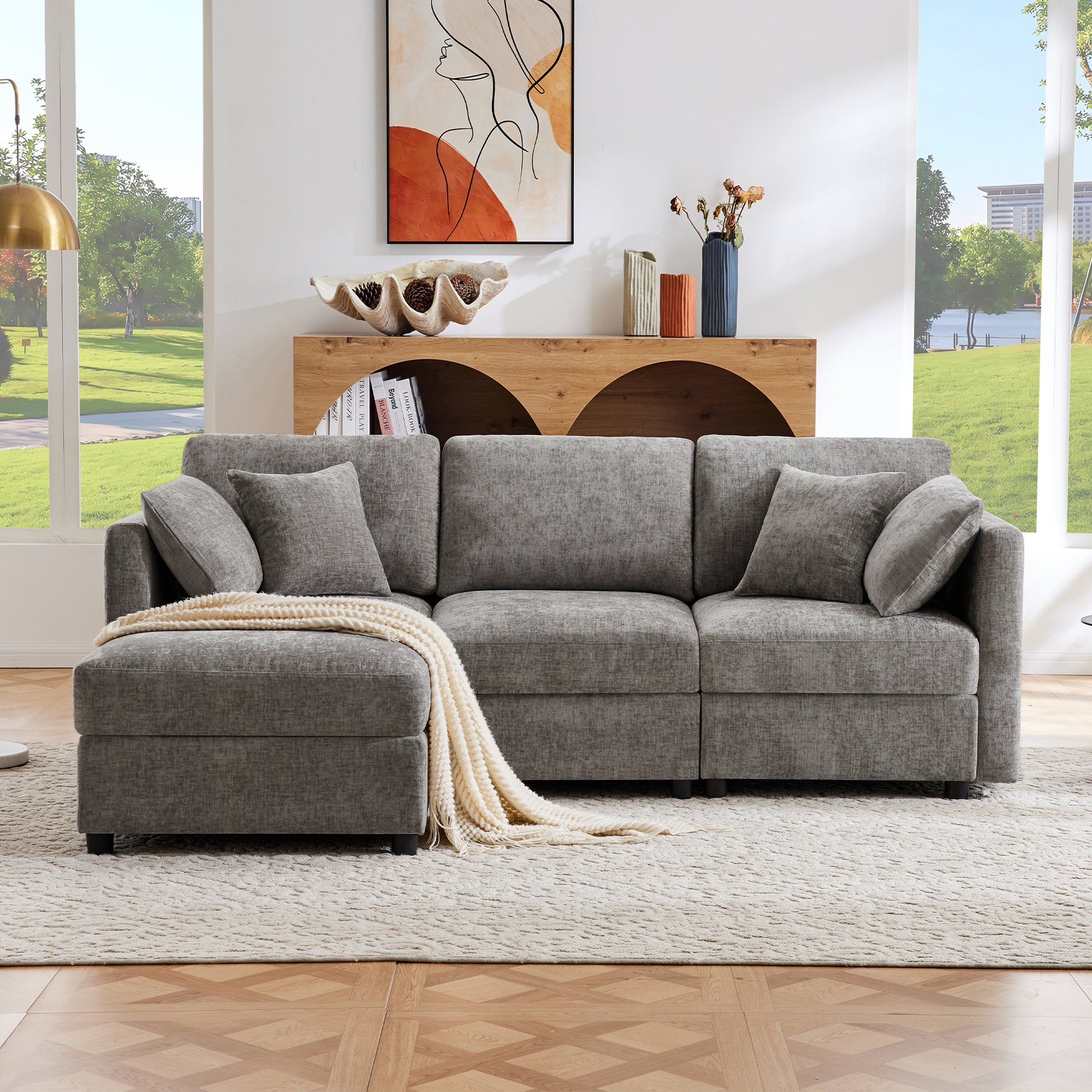Narożna sofa w kształcie litery L - 3-osobowa - z podnóżkiem - 4 poduszki - regulowane podłokietniki - szara - 3