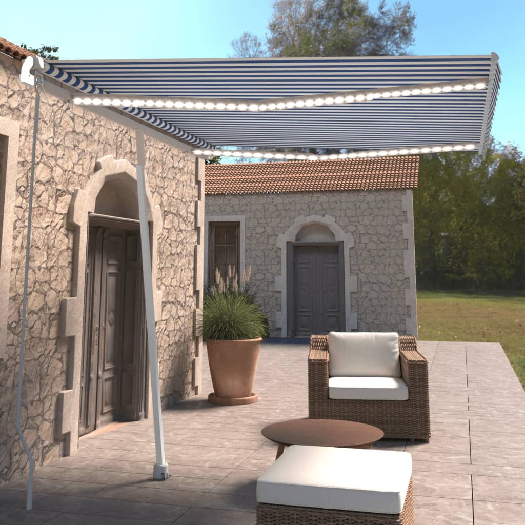 Ręcznie zwijana markiza z LED, 300 x 250 cm, niebiesko-biała vidaXL