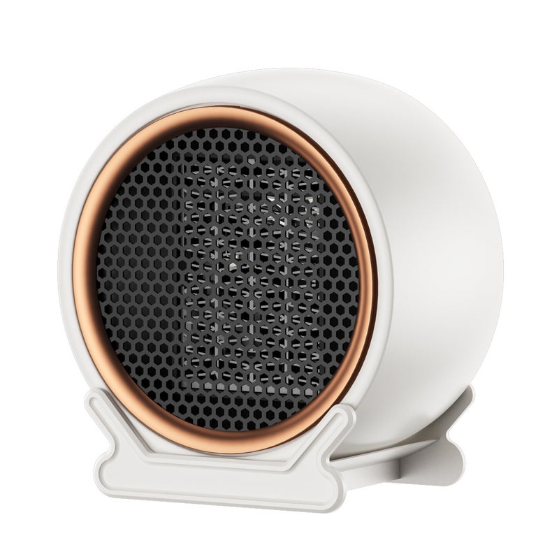 Mały biały grzejnik elektryczny, wydajny i szybko nagrzewający się wentylator, elektryczny grzejnik biurkowy do domu i biura.