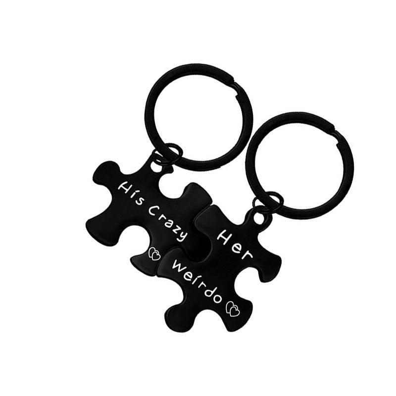 Coppia di ciondoli in acciaio - puzzle, di colore argento-nero | Gioielli Eshop IT