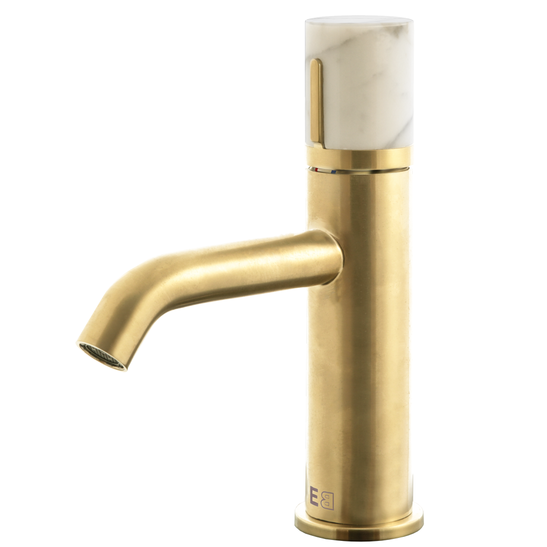Manopola mezclador bajo lavabo oro y mármol