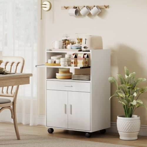 Armario de microondas con estantes, puertas dobles, cajones y ruedas en color blanco