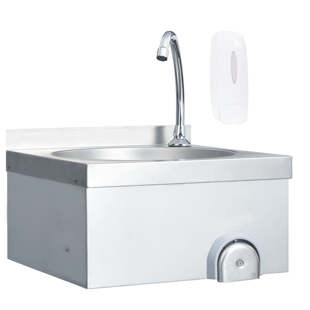 Lavabo de acero inoxidable con grifo y dispensador de jabón.