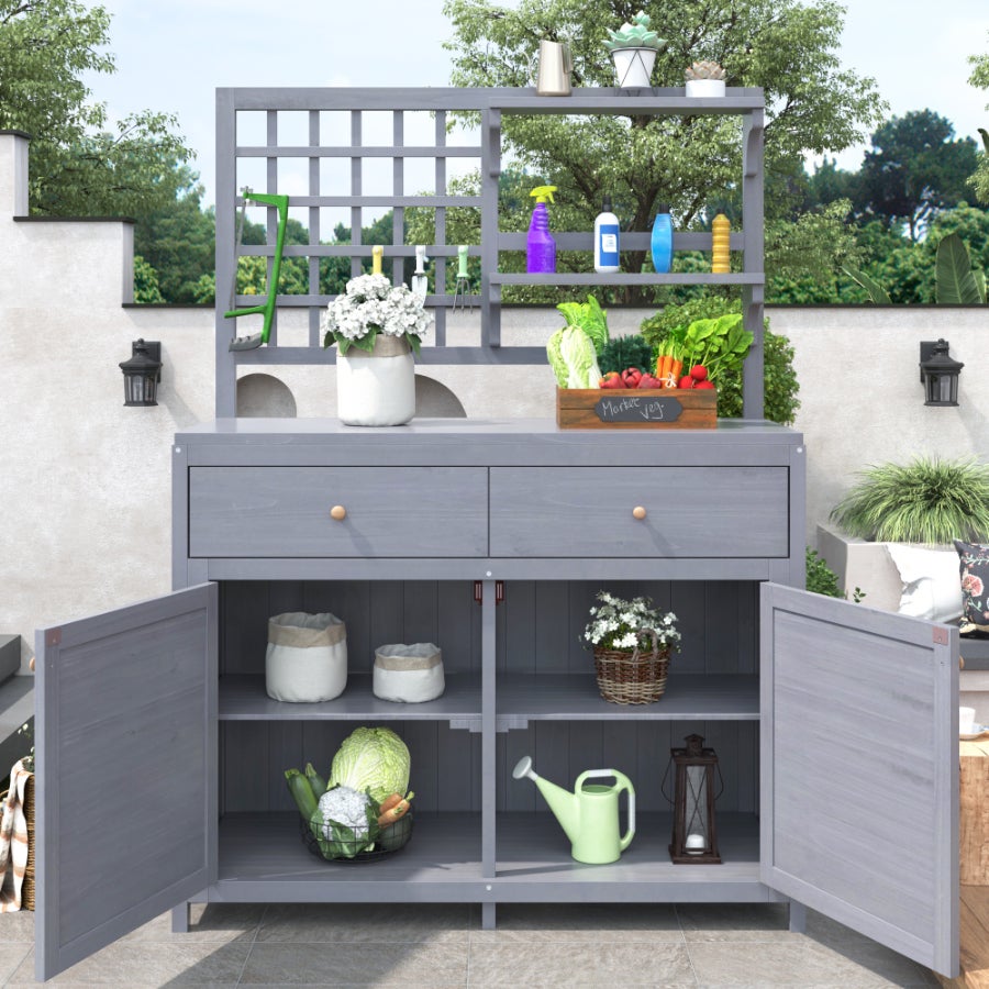 Drewniana szafka ogrodowa z półkami, szufladami i blatem roboczym – bezpieczne i stylowe przechowywanie na zewnątrz