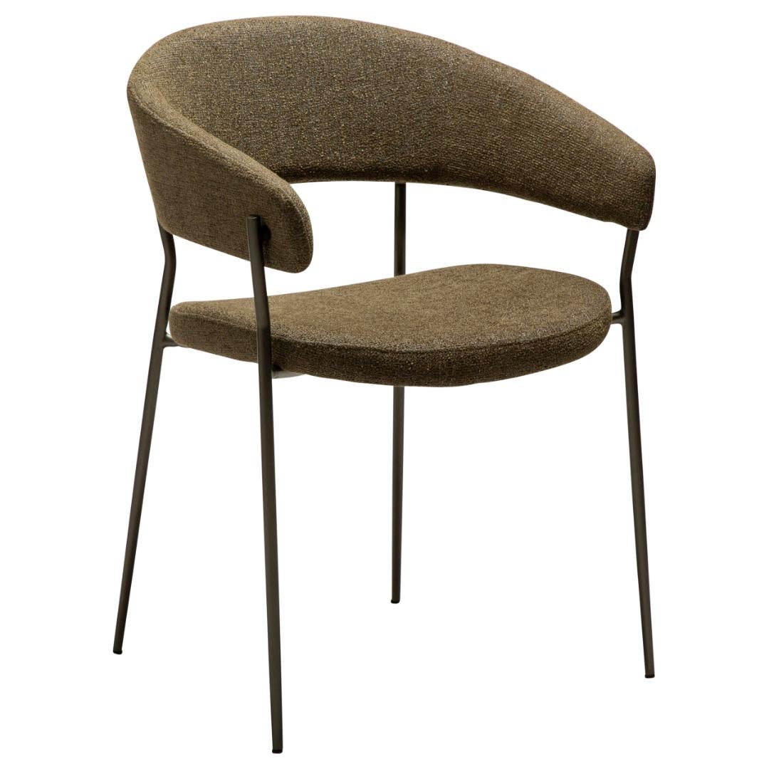 Reboot Dan-Form krzesło stołowe z podłokietnikami bouclé ciemnozielony.