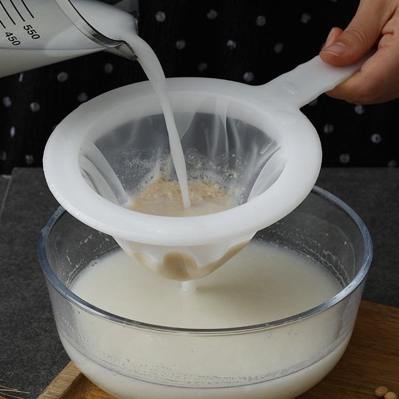 Filtr ultradrobny (200 oczek), lejek domowy do soku ultradrobnego, filtr separujący, separator żużla, łyżka kuchenna, łyżka sitowa