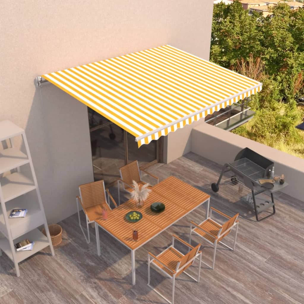 Toldo manual retráctil de 450x300 cm, amarillo y blanco.