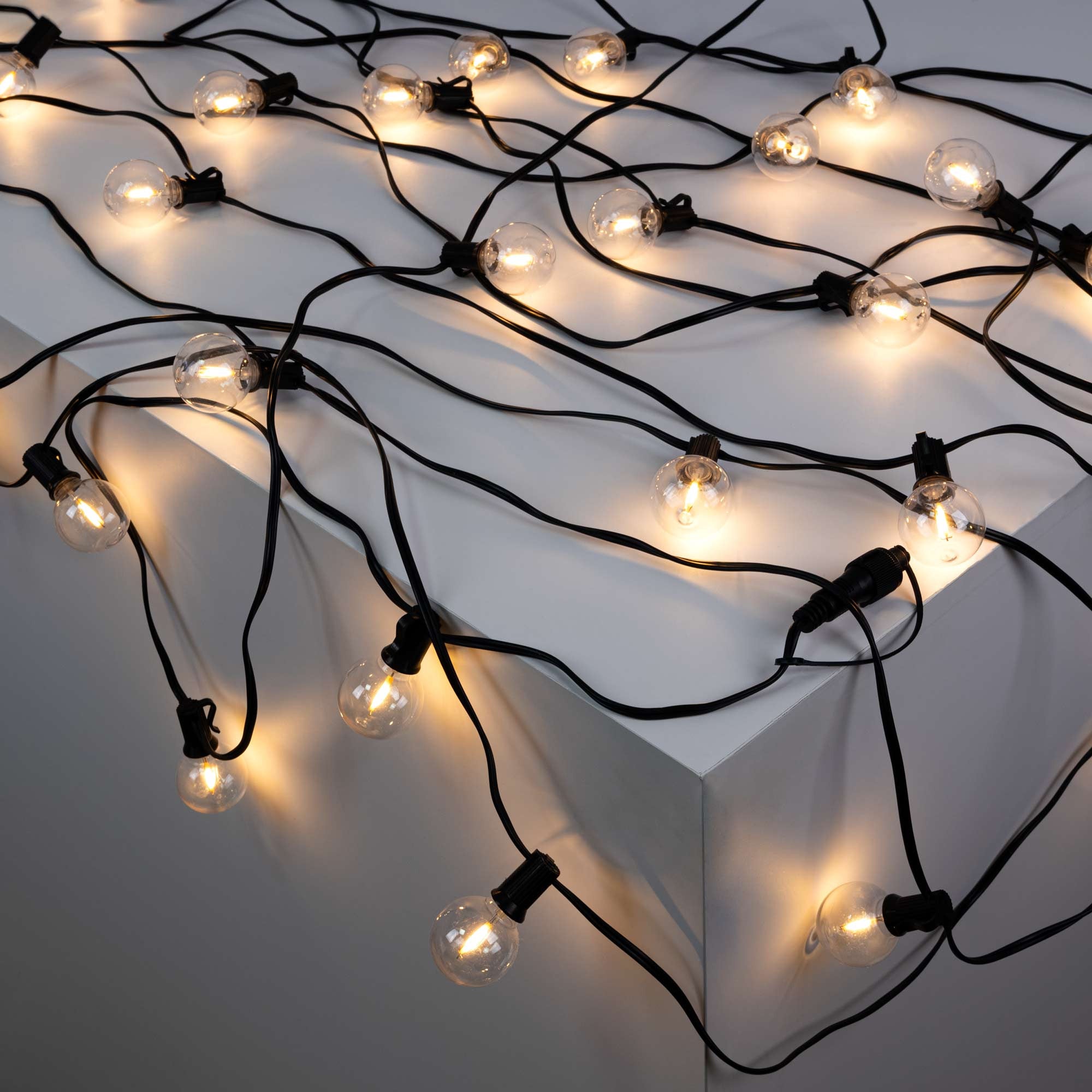 Ghirlanda luminosa per esterni 15 + 2 metri - 30 lampadine a filamento LED E12 G40 1W - IP44 - Bianco caldo - 5