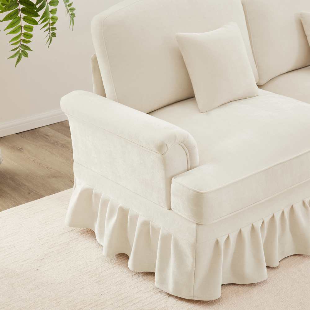 Divano modulare 3 posti a forma di L in chenille con braccioli a tromba, gonna arricciata removibile, gambe sottili e pouf mobile - 4