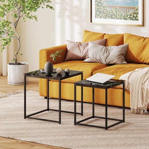 Set tavolini quadrati con piano in vetro e struttura in acciaio